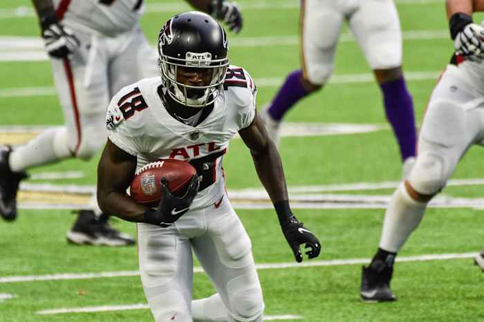 Atlanta Falcons WR Calvin Ridley runs after making catch